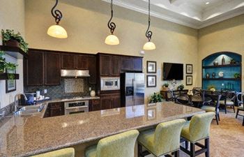 Slab Granite Countertops in Kitchen at Rosina Vista in Chula Vista, CA