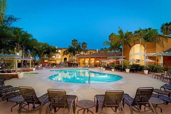 Pool View In Dusk   at Missions at Sunbow Apartments, Chula Vista, California - Photo Gallery 5