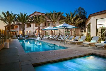 Resort style pool with lounge chairs at Ocean Air, California