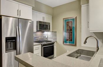 Model Unit Kitchen at Avino in CA 92130