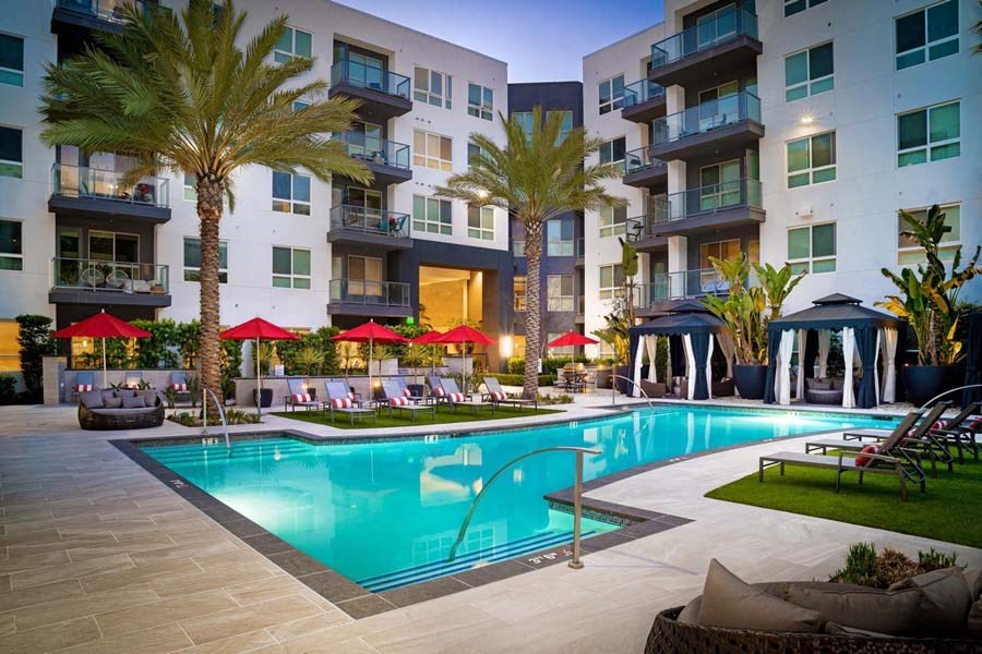 Resort-like grand courtyard with outdoor pool at Vora Mission Valley, San Diego, 92120