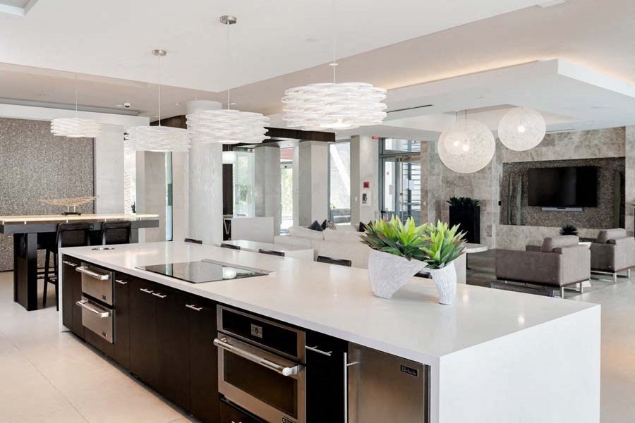 Clubhouse kitchen with Island at Vora Mission Valley, San Diego