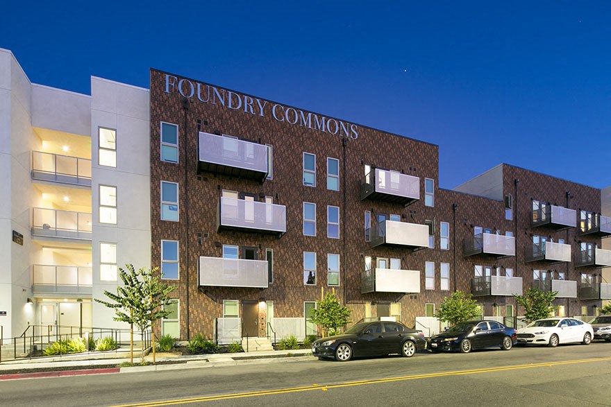 Exterior of building with property sign