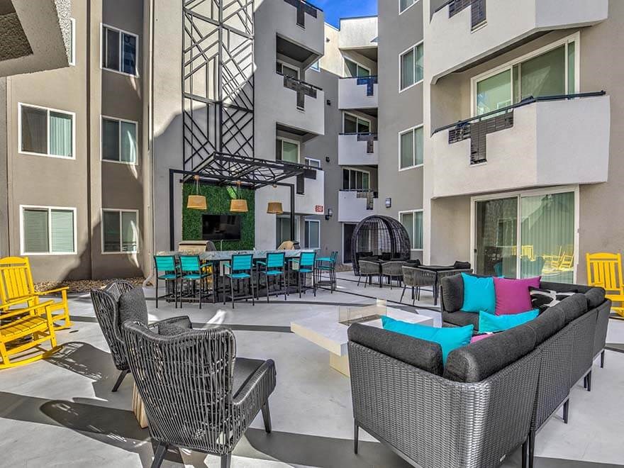 our apartments have an open courtyard with seating and tables