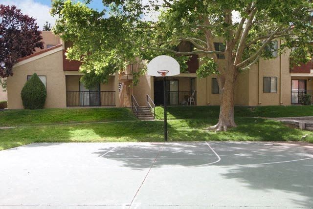 a building with a basketball hoop in front of it