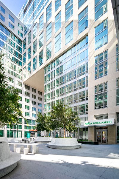 a large building with a large fountain in front of it