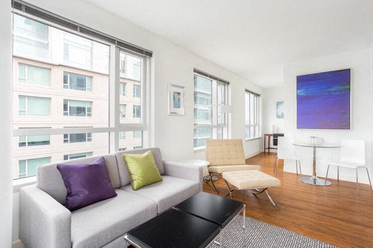 a living room with a couch and a table