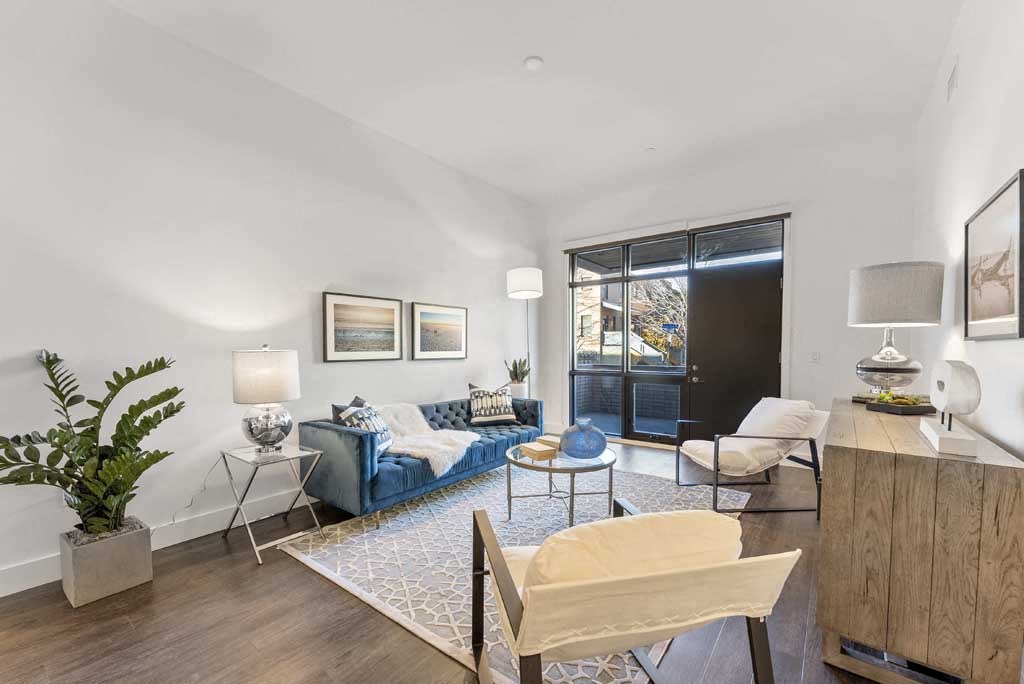 a living room with a couch and a chair