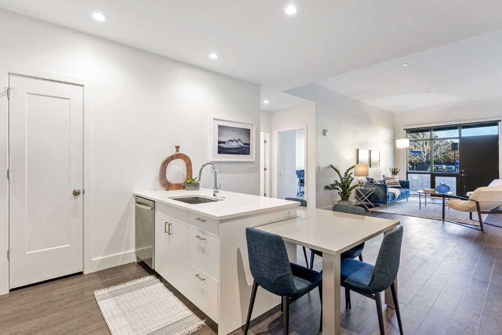 a kitchen with a sink and a table