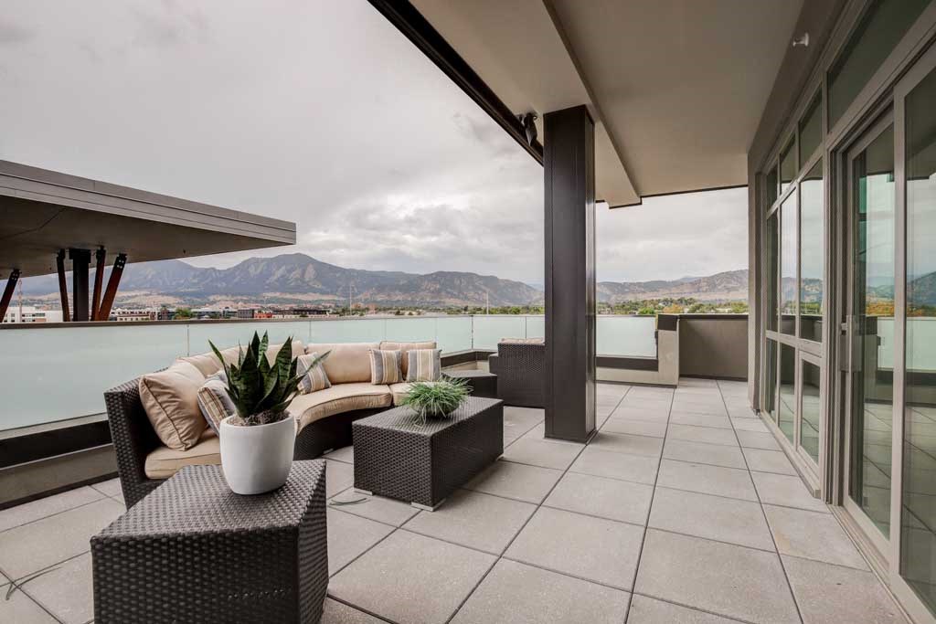 a view of a lake from a balcony