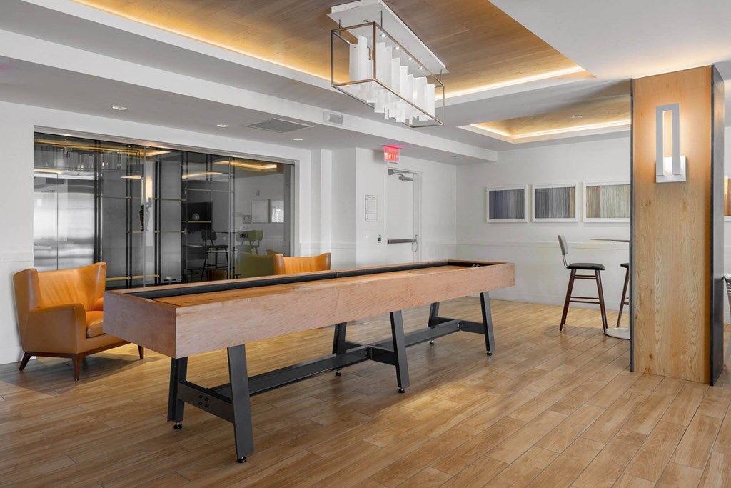 a pool table in the clubhouse