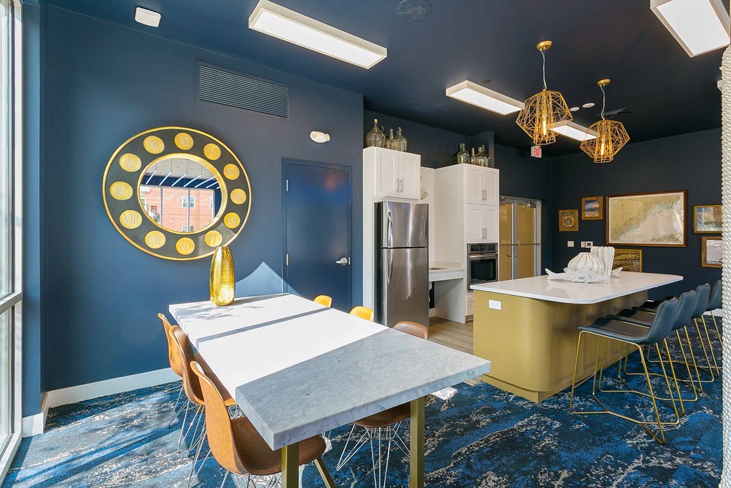 a dining room with a table and chairs