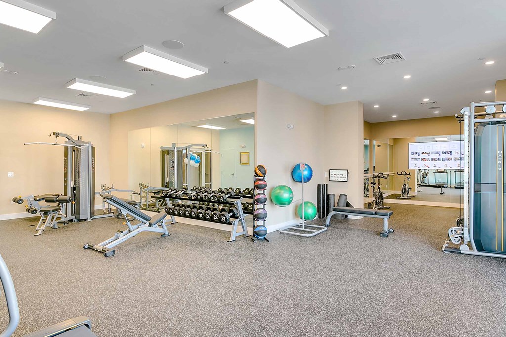 a gym with weights and other exercise equipment