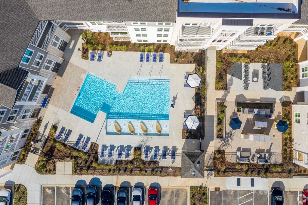 an aerial view of the pool at the resort
