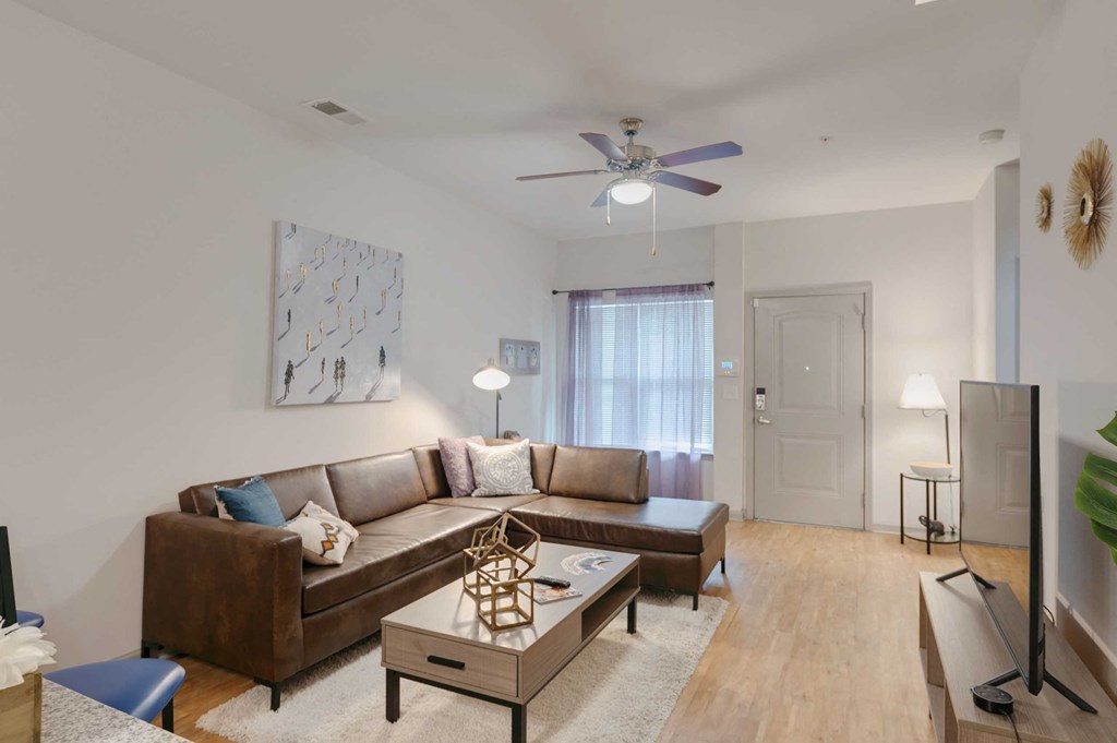 a living room with a couch and a coffee table