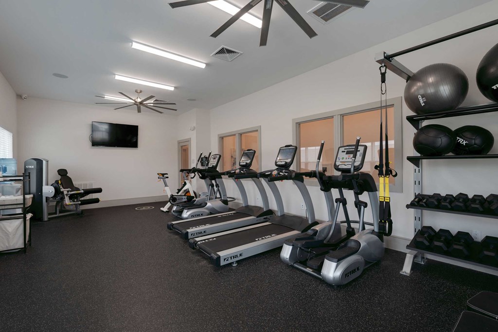 the gym at the flats at big tex apartments
