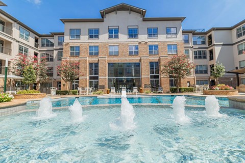 Pool and building at Auxo at Memorial, Houston