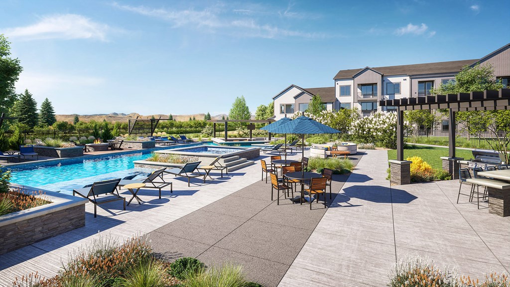 an outdoor patio with tables and chairs and a swimming pool
