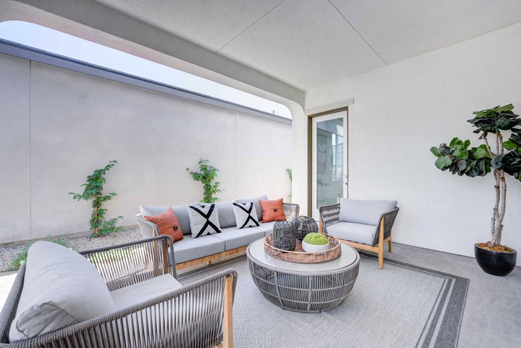 a living room with a couch and a table