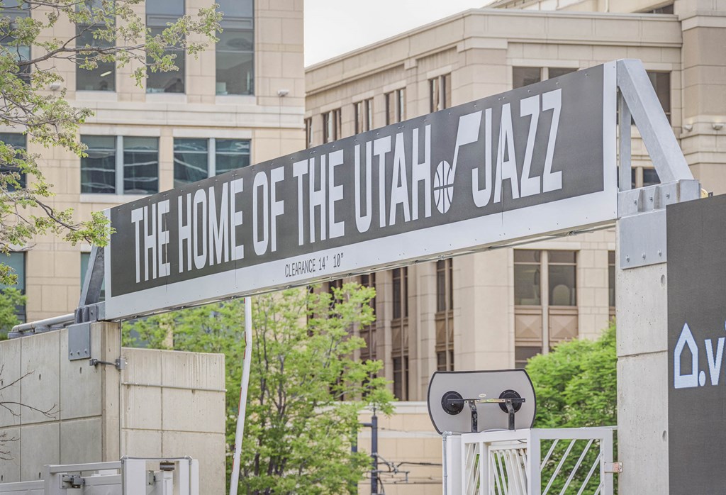 a sign for the home of the city of jazz in front of a building