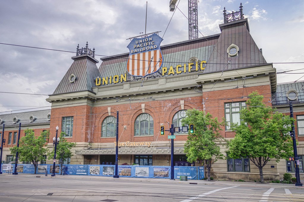 the union pacific train station on the corner of a city street