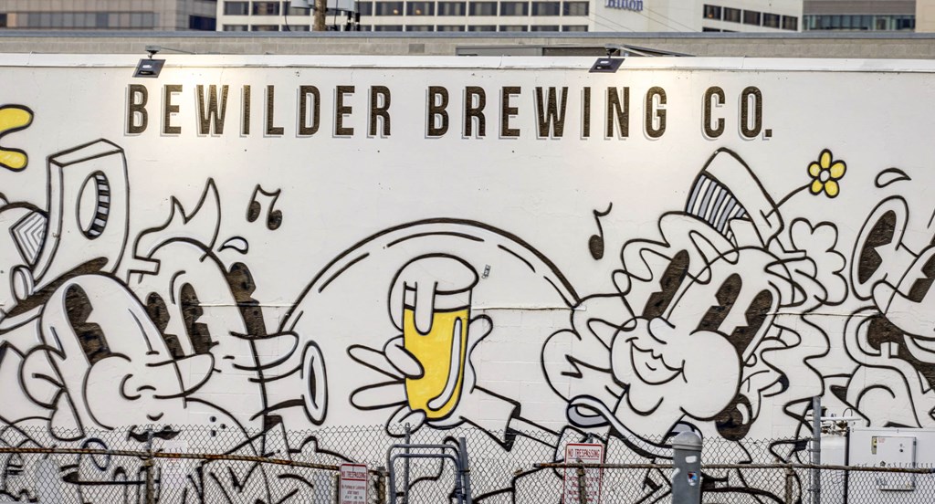 a mural on the side of a beer truck