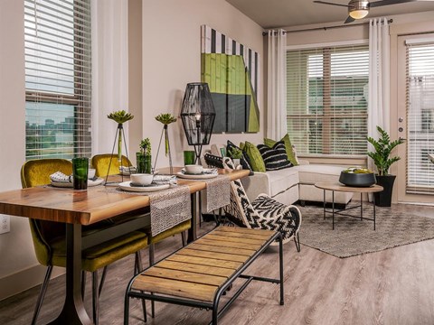 Living room with dining table at The Kelley at Samuels Ave, Fort Worth, 76102
