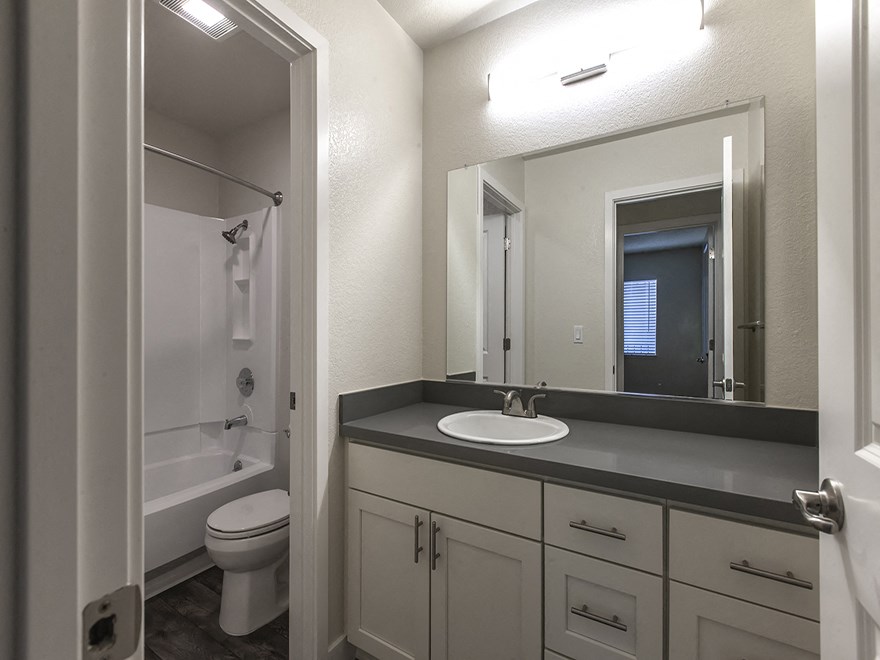 the preserve at ballantyne commons bathroom with sink toilet and shower