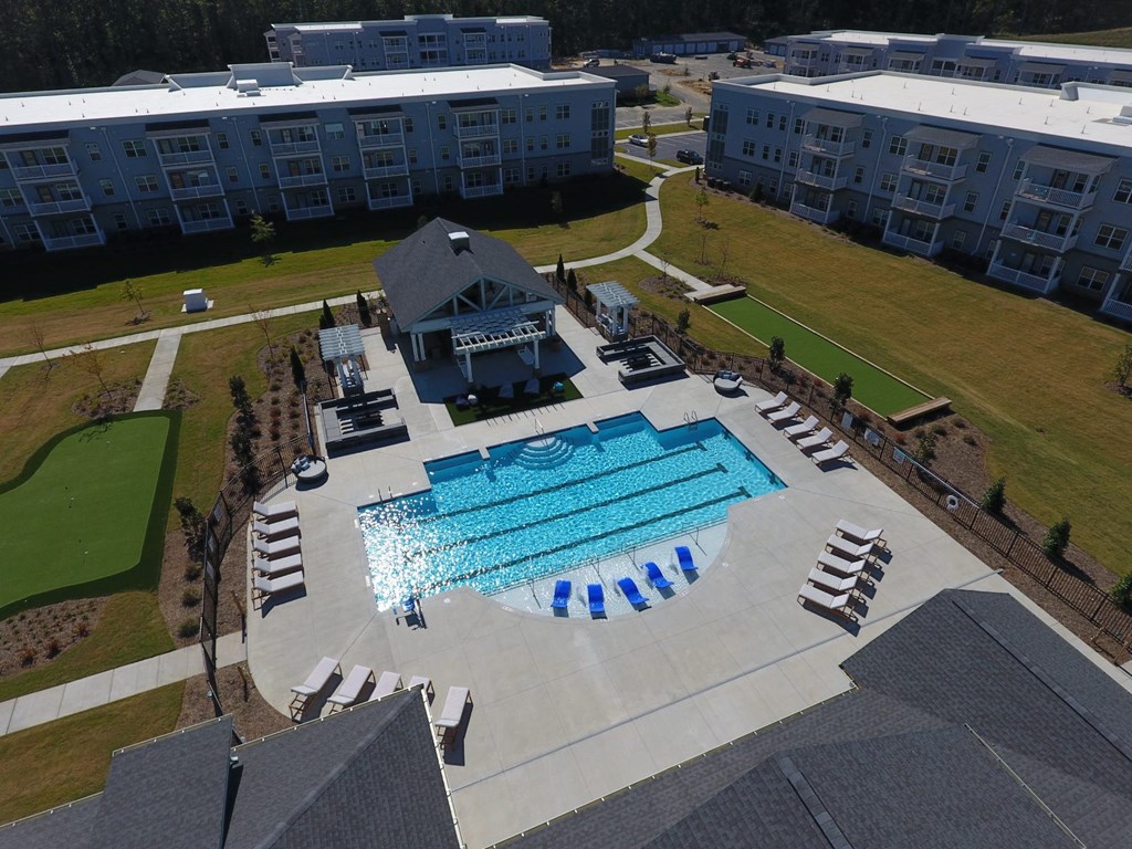 an aerial view of a swimming pool at the resort