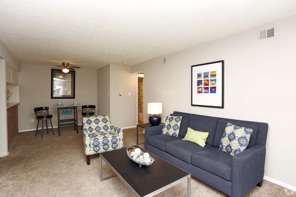 a living room with a couch and a table