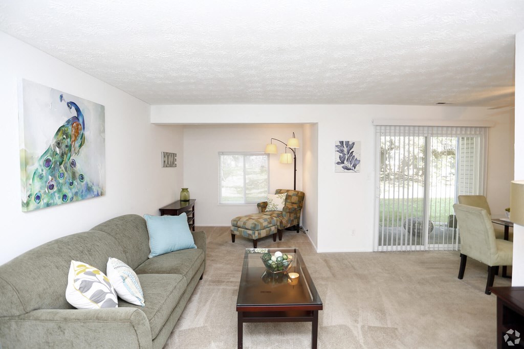 a living room with a couch and a coffee table