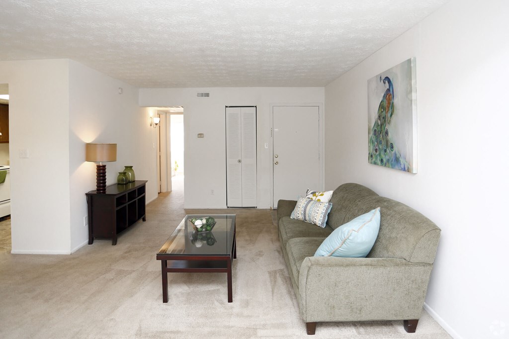 a living room with a couch and a coffee table