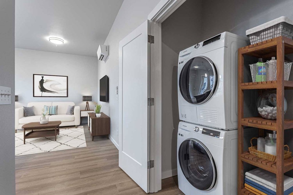 a washer and dryer in a living room at The Farmstead, Vancouver, WA