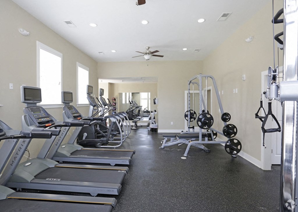 the residence apartments fitness room with cardio equipment
