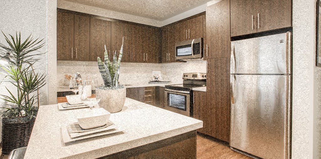 a kitchen with a sink and a refrigerator