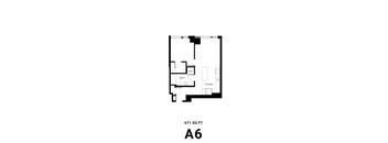an open floor plan with a bedroom and a living room