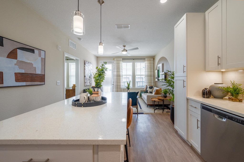 a living room with pink and purple lights