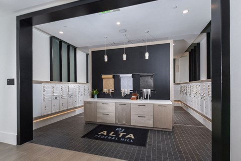 a large room with a bar in the middle of it