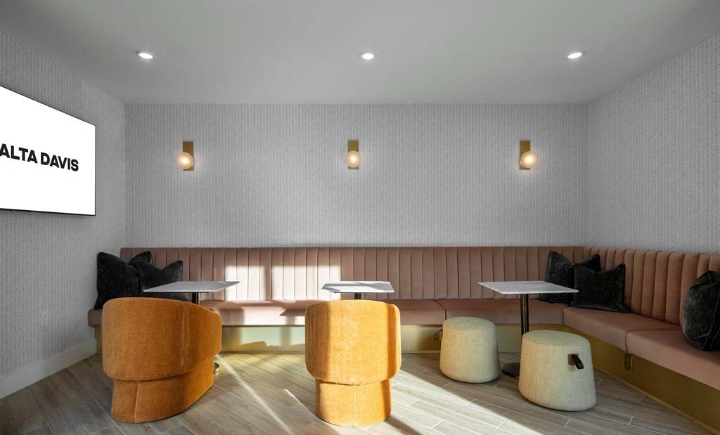 a lobby with tables and chairs and a couch