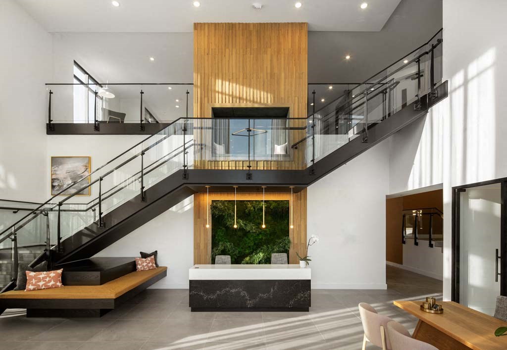 a staircase in the middle of a living room