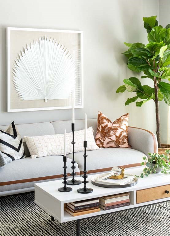 a living room with a couch and a coffee table