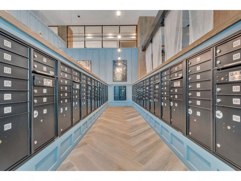 the lockers are lined up in a long room with wood floors