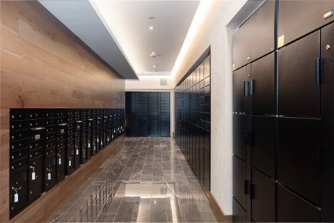 a long hallway with rows of wine lockers