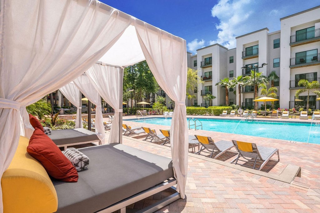 a collage of photos of a swimming pool with a couch and chairs