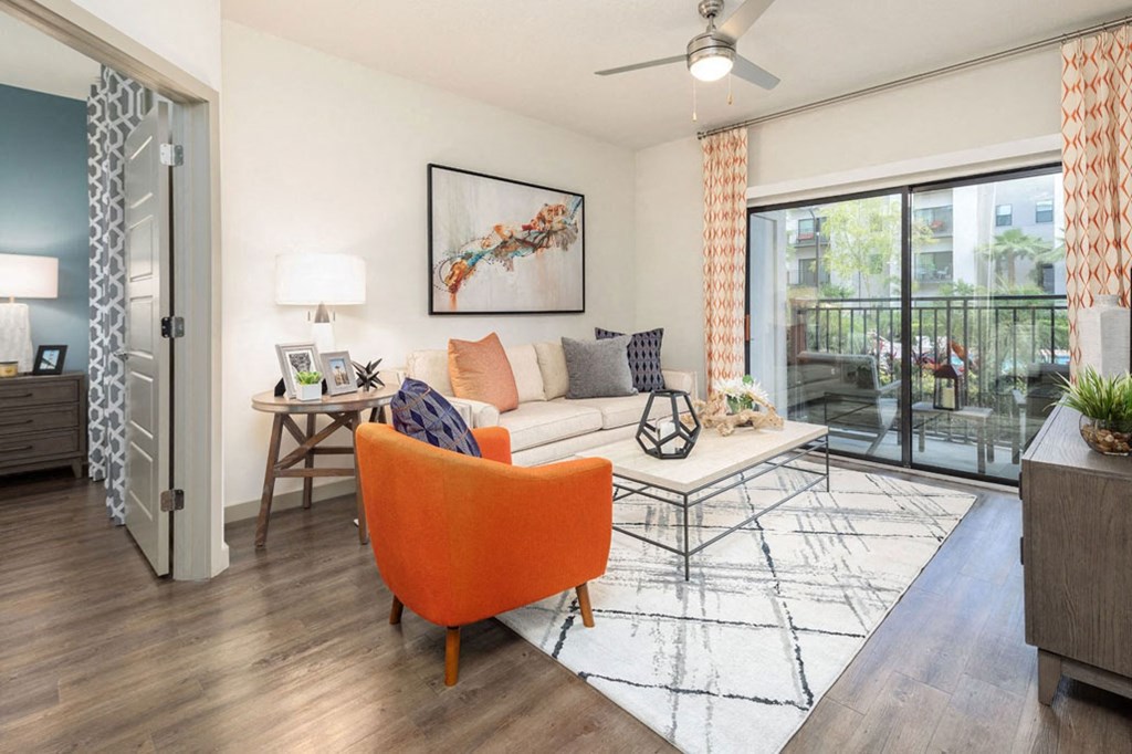 a living room with a couch and a table