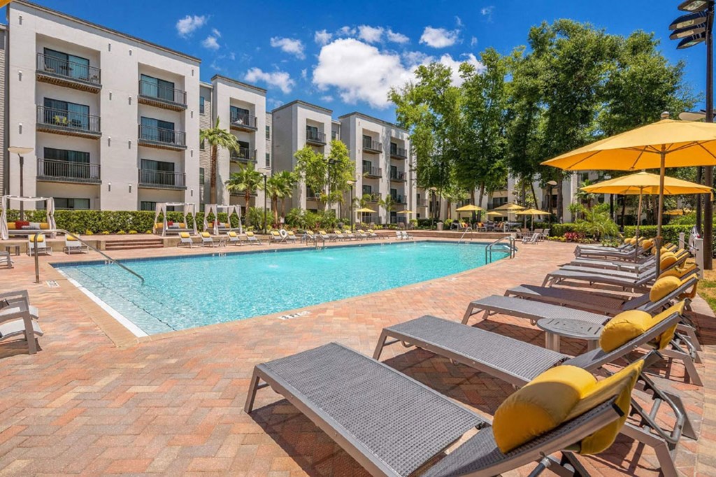 our apartments have a large pool and lounge chairs