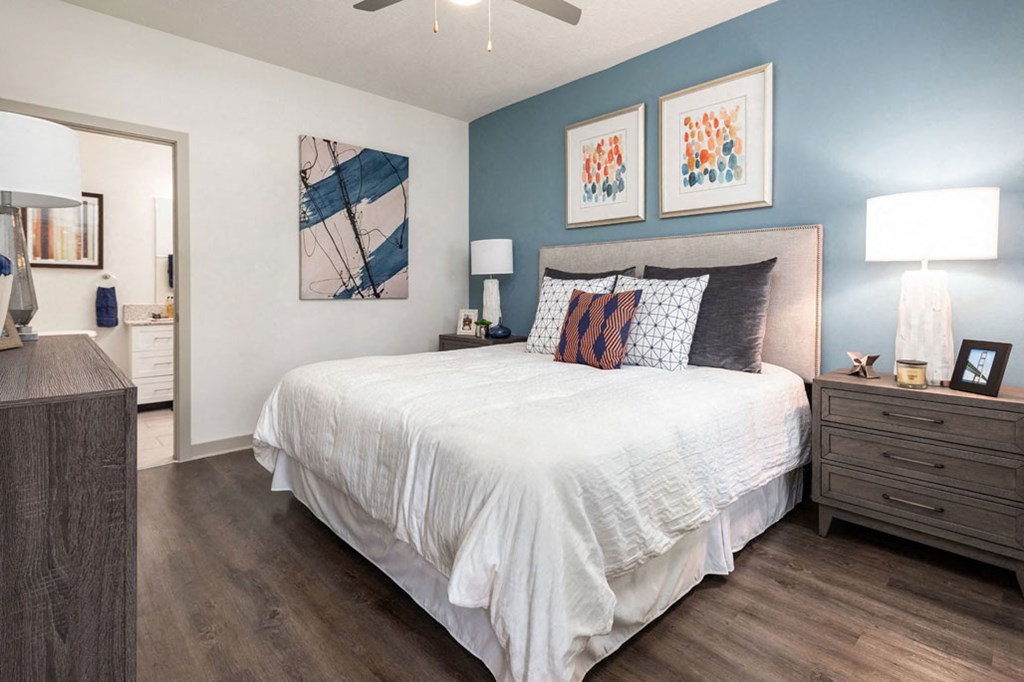 a bedroom with a bed and a closet