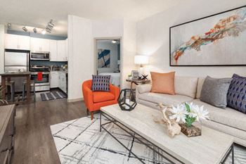 a living room with a couch and a table