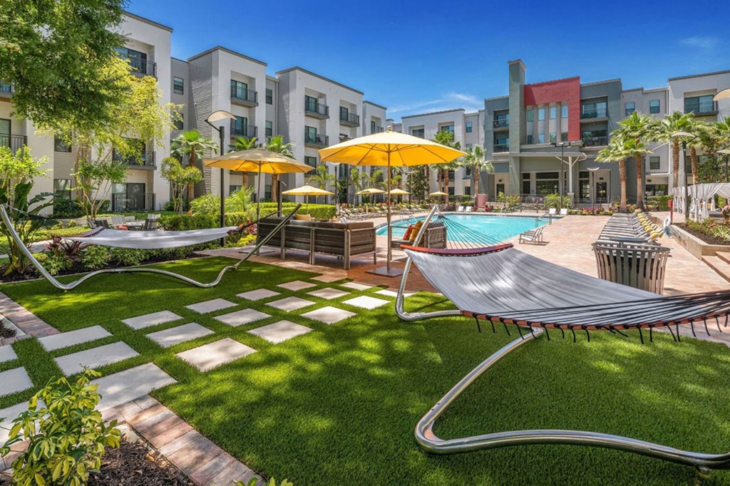 our apartments have a large pool and lounge chairs