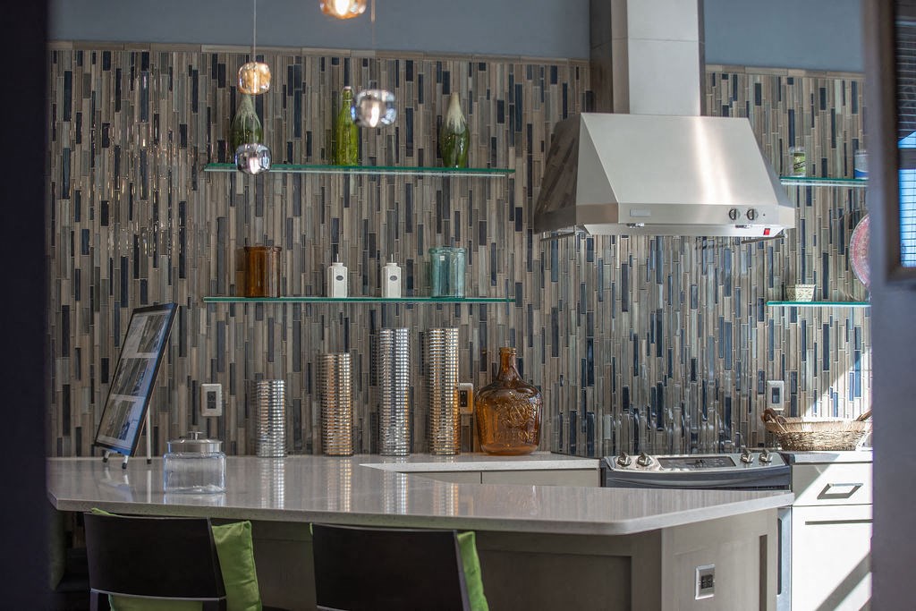 a kitchen with a counter top and a stove